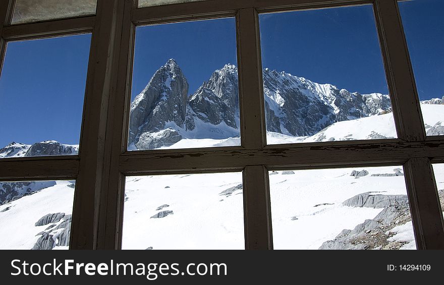 Yulong snow moutian, china. looking from a window. Yulong snow moutian, china. looking from a window.