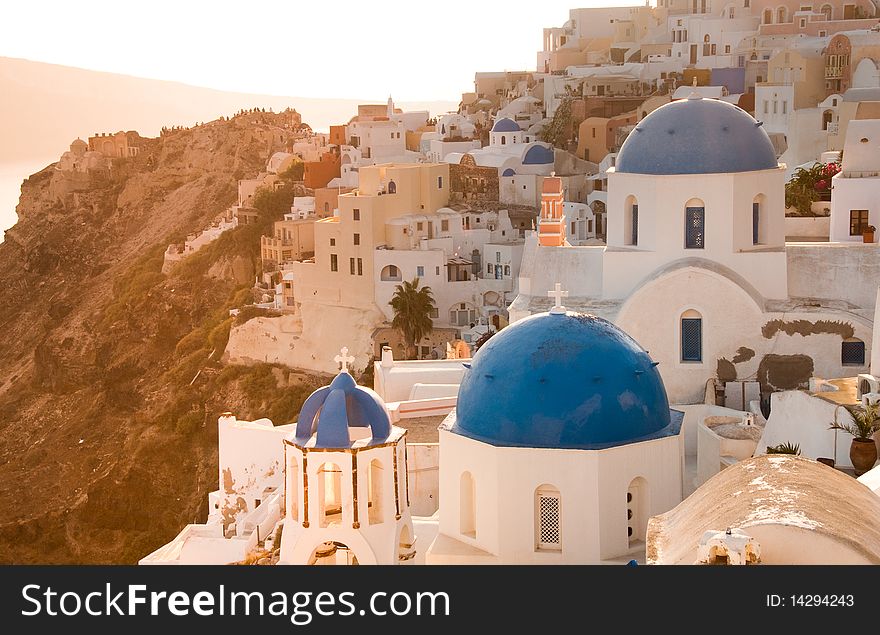 Greek church in santorini greece with a cross