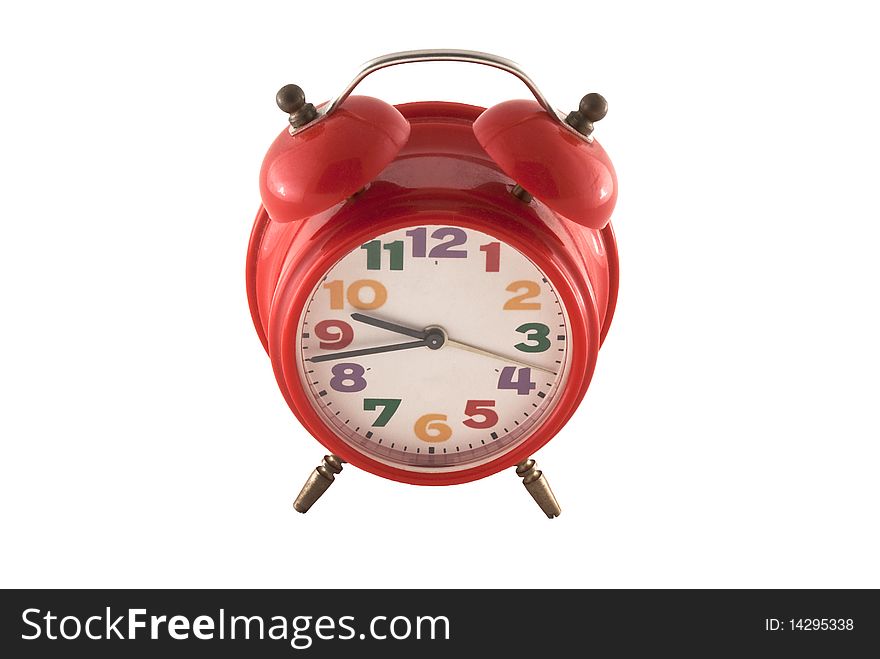 Red alarm clock on a white background