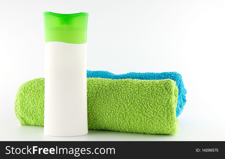 Colorful rolled towels and bath products