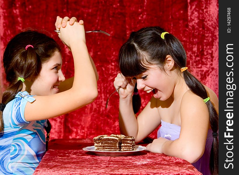 Two Lovely teen girls with cake