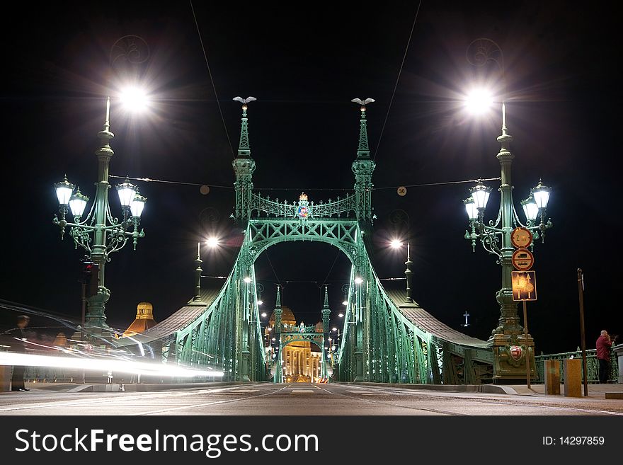 Liberty bridge by night in budapest, hungary