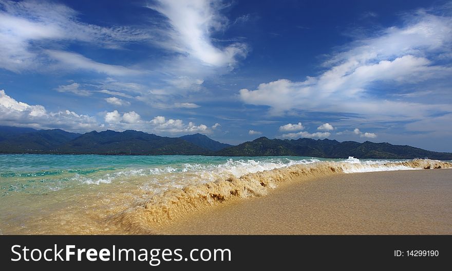 Waves breaking on a tropical Asian island. Waves breaking on a tropical Asian island
