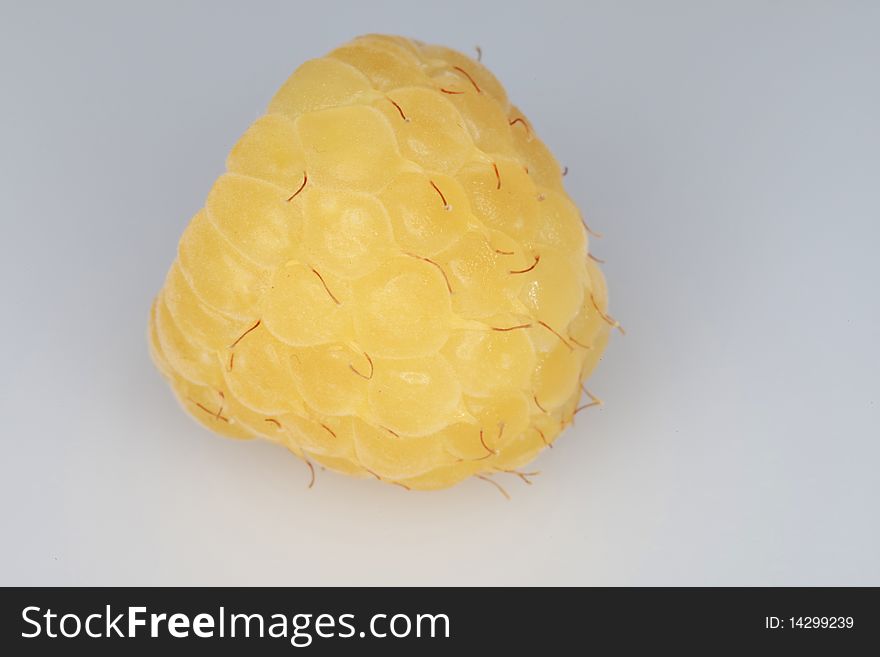 Fresh, ripe, golden raspberry isolated on a white background. Fresh, ripe, golden raspberry isolated on a white background