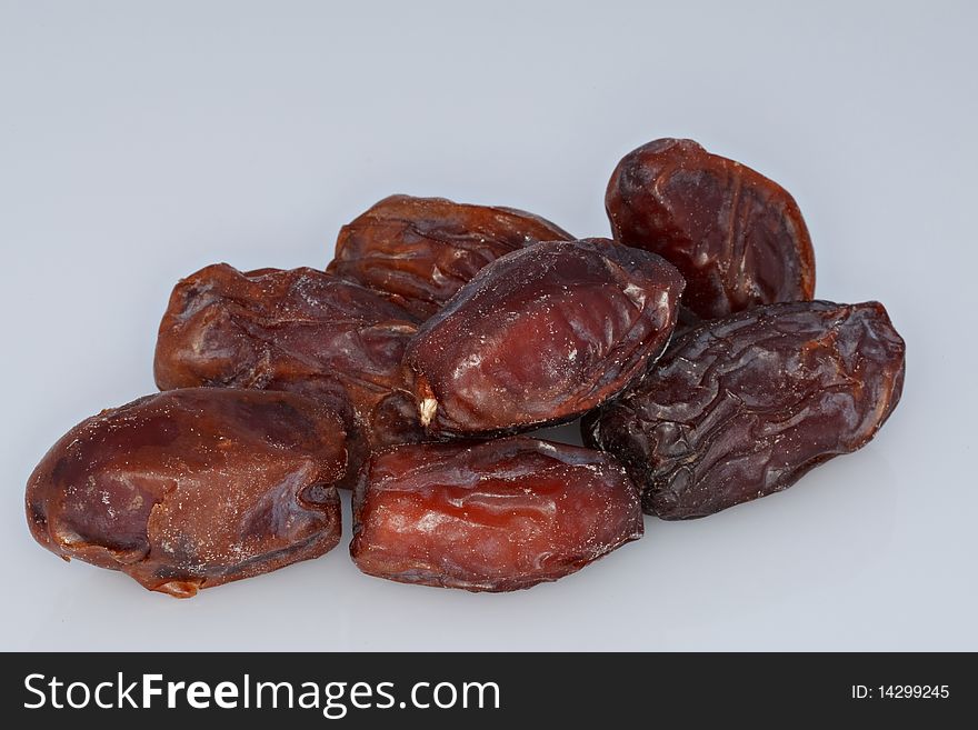 Group of Medjool dates isolated on white