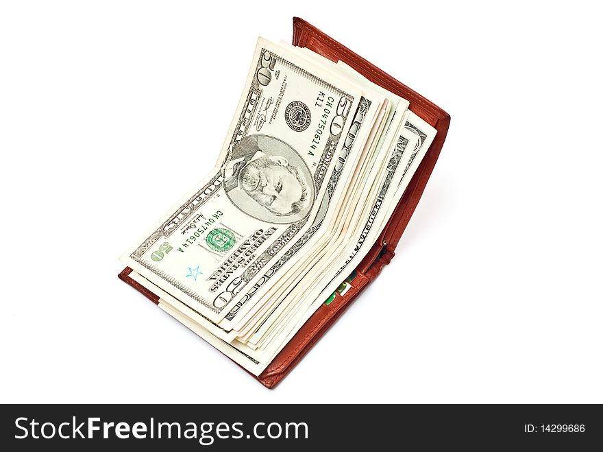 Dollar notes in brown wallet isolated on white background. Dollar notes in brown wallet isolated on white background