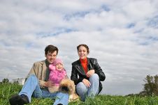Family With Baby And Dog Stock Images