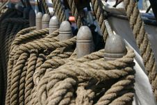 Row Of Ropes Tied Around Wooden Cleats Stock Photos Row Of Ropes Tied Around Wooden Cleats Stock Photos