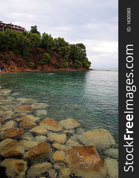 Clear water sea with stone and island