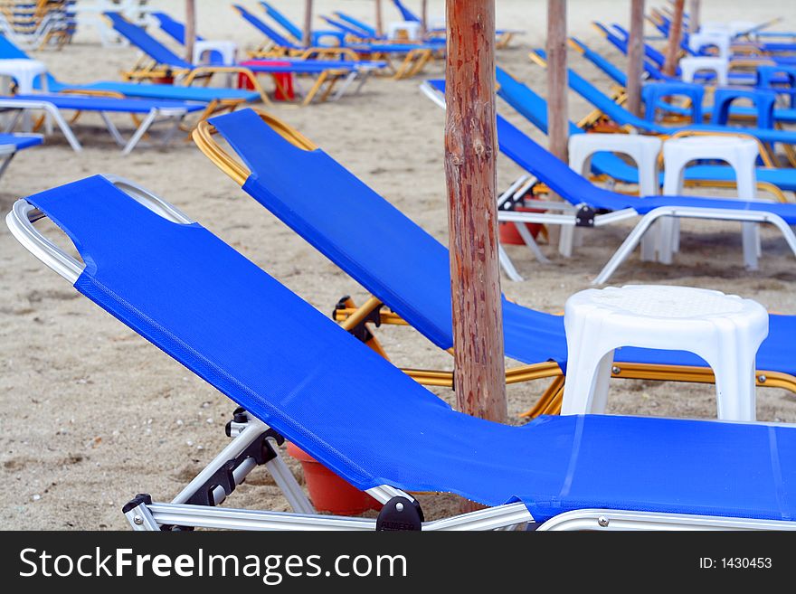 Sun loungers and beach umbrella. Sun loungers and beach umbrella