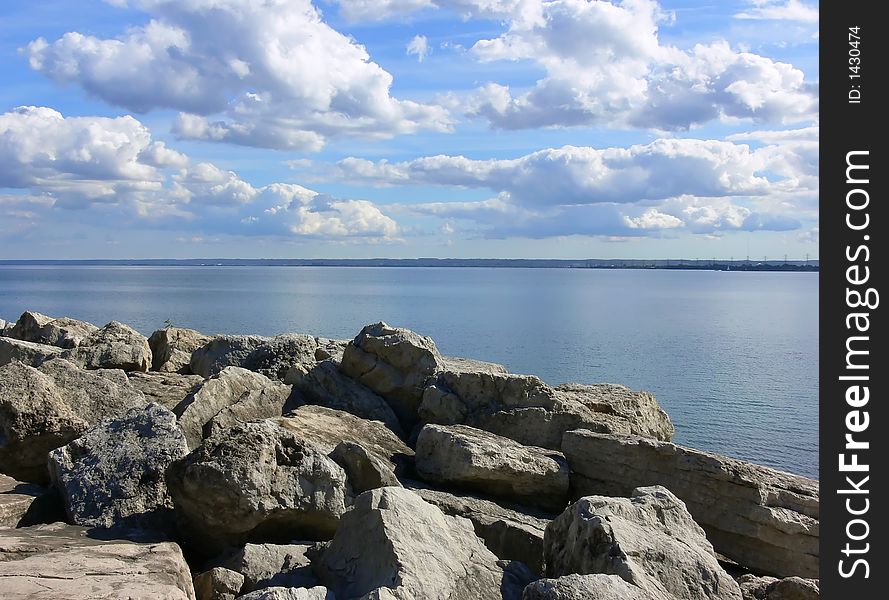A rock wall on the lake Ontario. A rock wall on the lake Ontario.