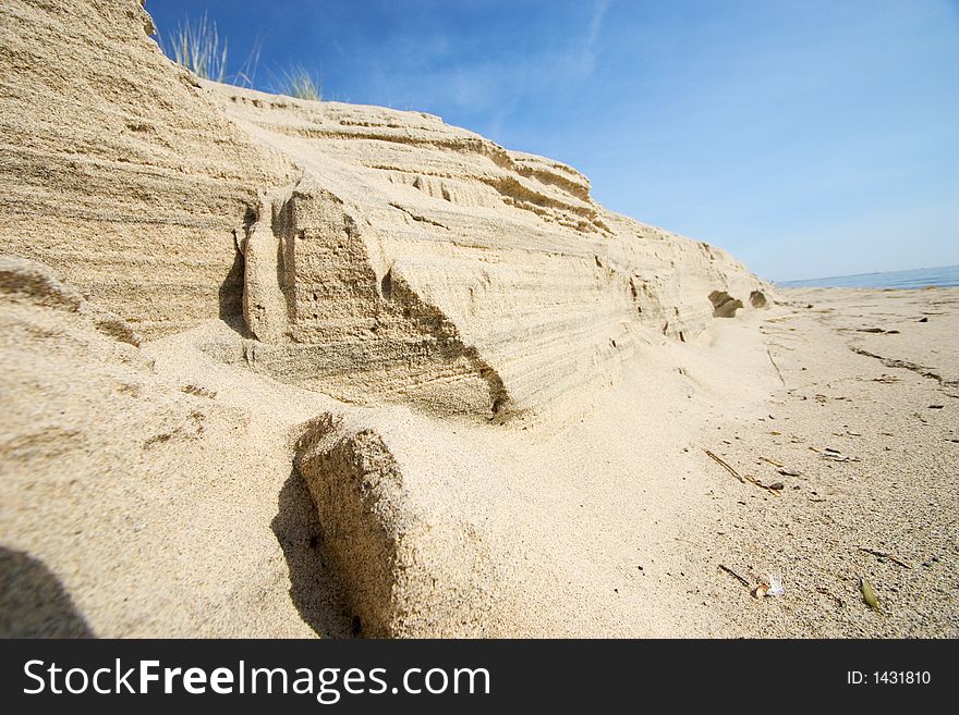 A sand dune on a beach