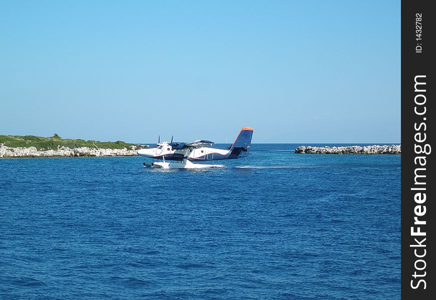 Sea plane taking off from the sea