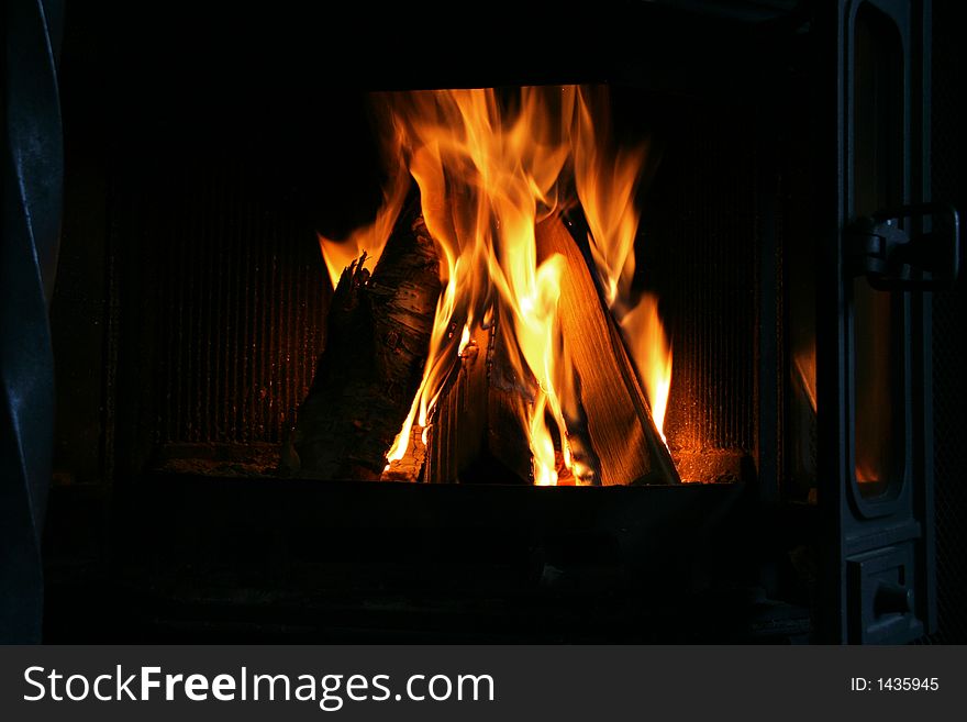 Burning wood logs in a fireplace