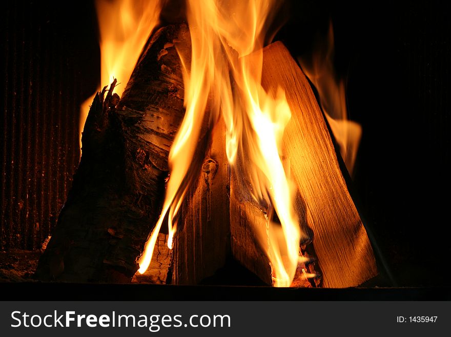 Burning wood logs in a fireplace