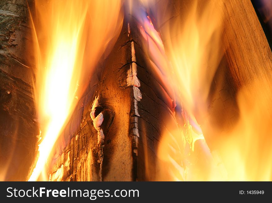 Burning wood logs in a fireplace