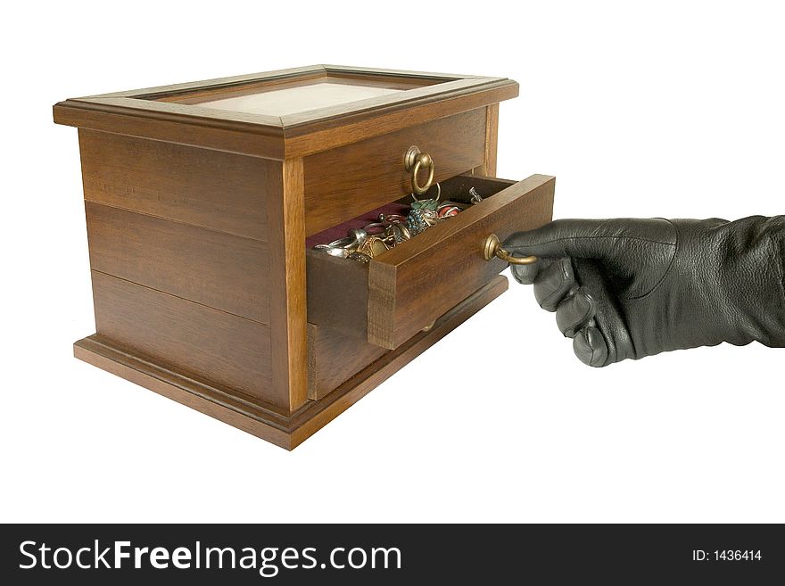 Hand In Black Glove Opening Casket With Jewelry