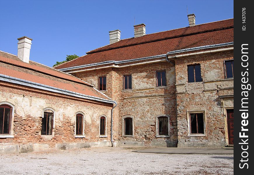 Courtyard of a palace under repair, Lovasbereny, Hungary.