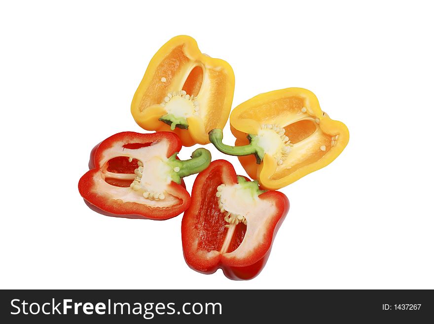 Red and yellow peppers halves isolated over white background