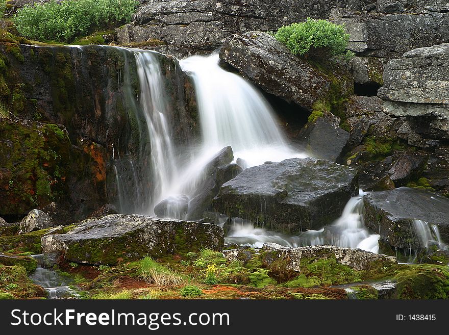 Rough mountain stream in northern mountains of the Europe. Rough mountain stream in northern mountains of the Europe