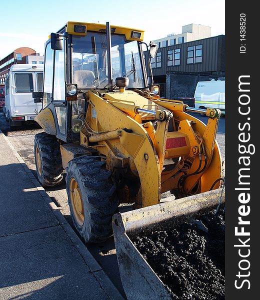 Tractor.
construction machine tractor.
transportation.