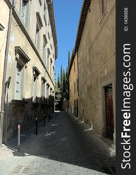 Medioeval narrow street with modern anti parking system in Orvieto Umbria