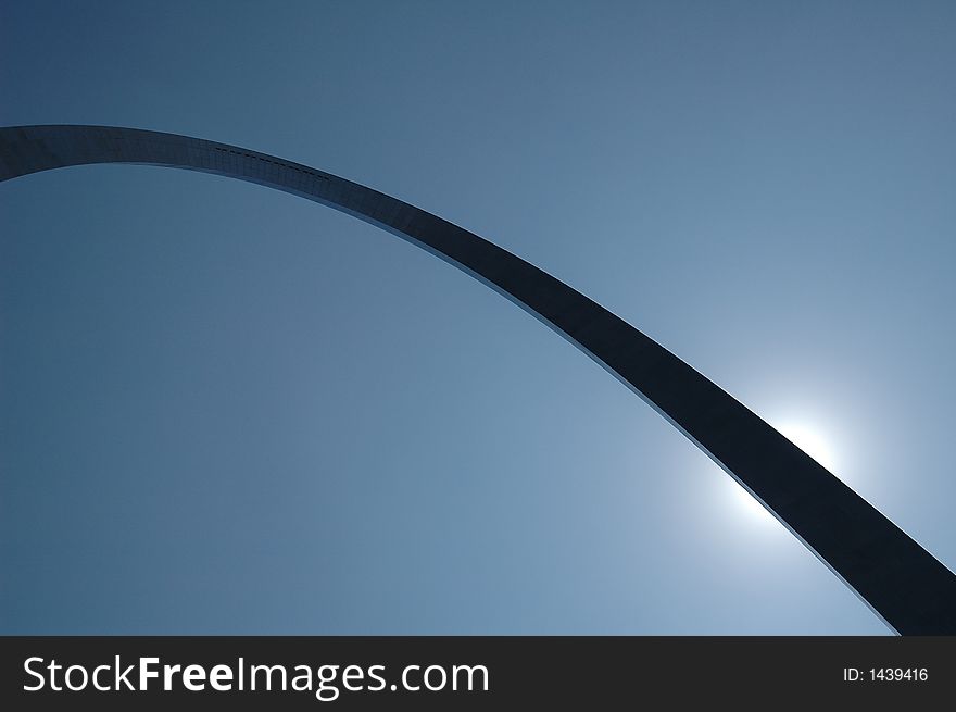 Saint Louis Arch with blue sky and sun. Saint Louis Arch with blue sky and sun