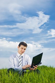 Businessman With Laptop Stock Photography