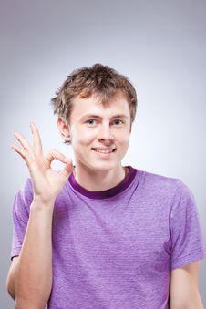 Young Man Making An Ok Sign Royalty Free Stock Photos Young Man Making An Ok Sign Royalty Free Stock Photos