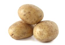 Raw Potatoes On A White Background Stock Photos