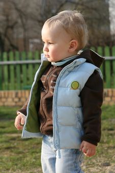 Baby Boy In Jerkin At Playground Stock Photos