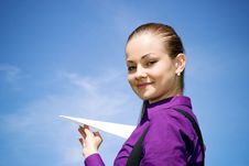 Young Caucasian Girl With Paper Plane In The Hand Stock Image Young Caucasian Girl With Paper Plane In The Hand Stock Image