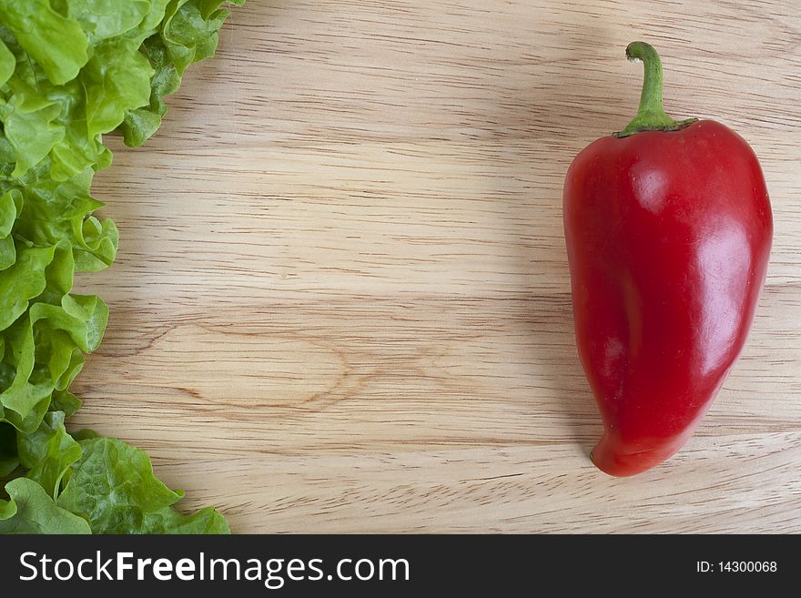 Fresh bell pepper on wooden board with space for text. Fresh bell pepper on wooden board with space for text