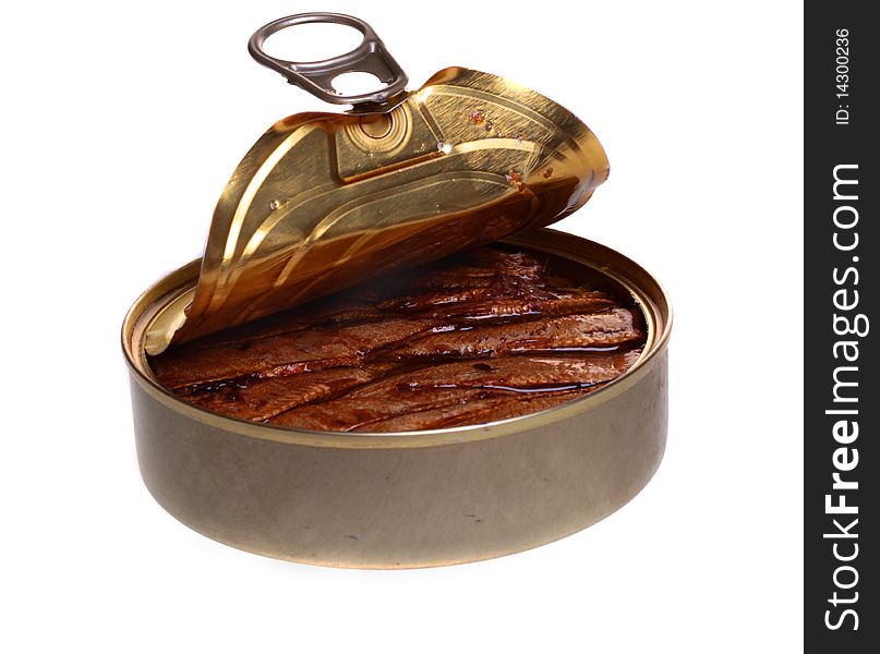 Open iron bank with canned fish in oil. Isolated object on a white background