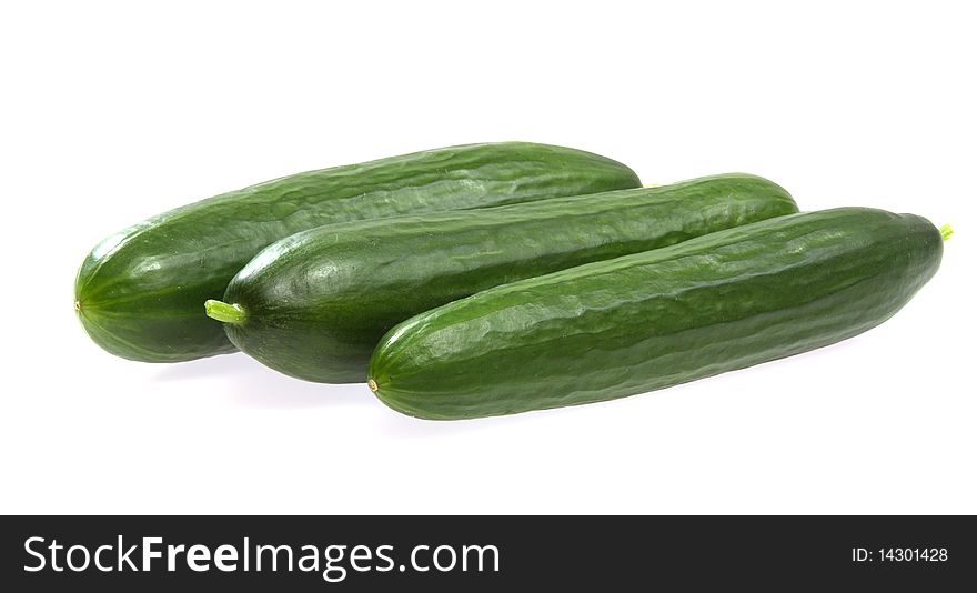 Fresh cucumbers on white background close up shoot