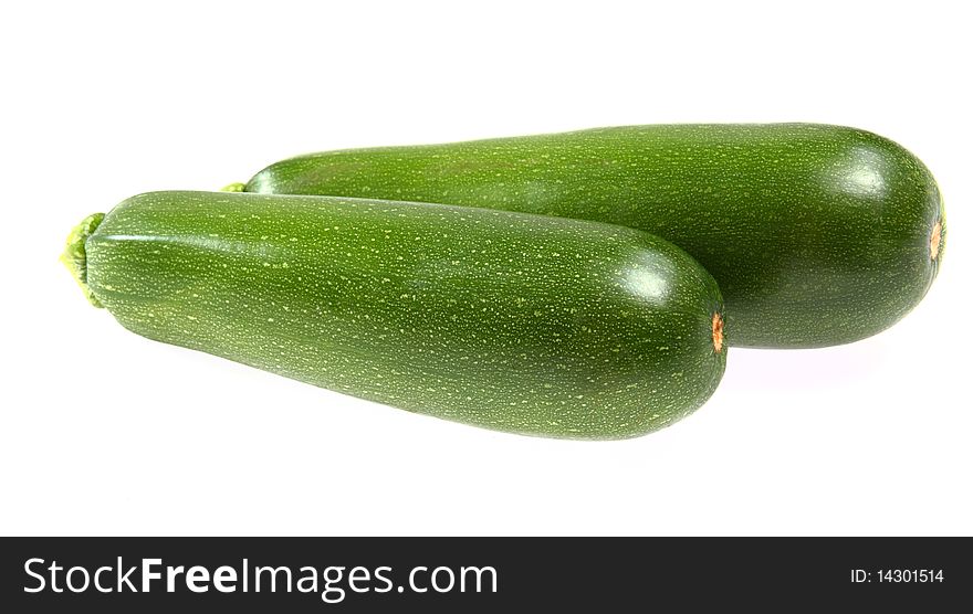Fresh vegetable - zucchinis isolated on white background