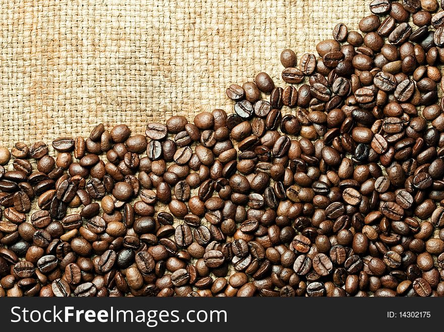 Fresh roasted coffee beans background. Fresh roasted coffee beans background