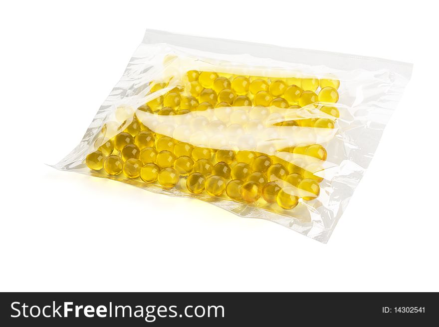 Gel capsule in polythene package isolated on white background. Gel capsule in polythene package isolated on white background