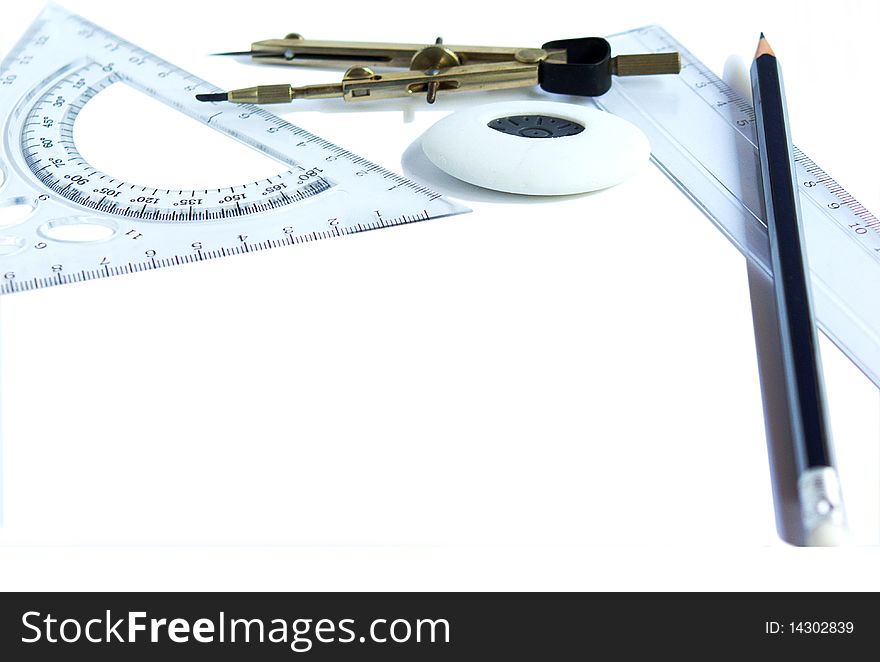 Pencil, ruler, compass and rubber on white background. Pencil, ruler, compass and rubber on white background