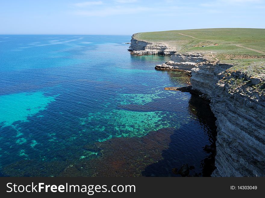 The stone cliffs at the coastline of the Black sea. The stone cliffs at the coastline of the Black sea