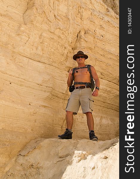 Man with backpack. Negev desert. Israel