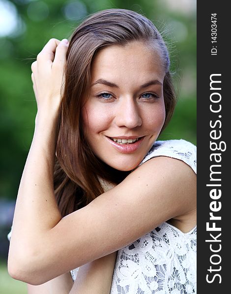 Closeup portrait of a happy young woman smiling