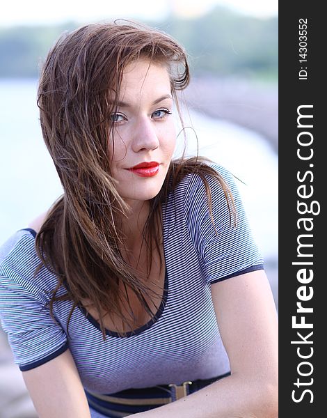 Closeup portrait of a happy young woman smiling