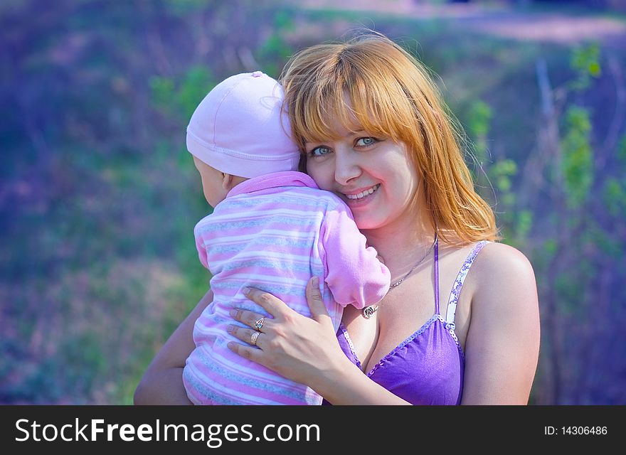 Mother and daughter outdoors in summer