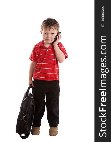 A very young boy has a black bag is is frustrated and. A very young boy has a black bag is is frustrated and