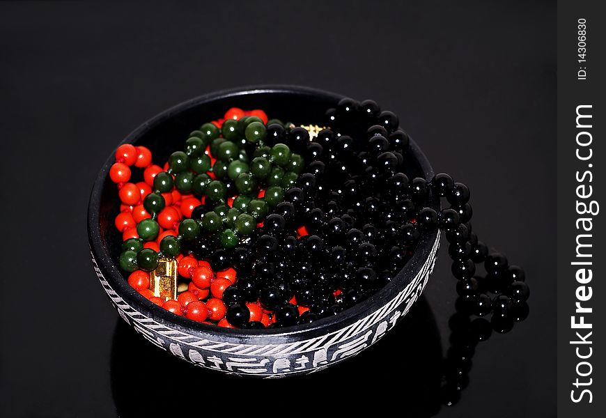 Pearl necklaces black green and red