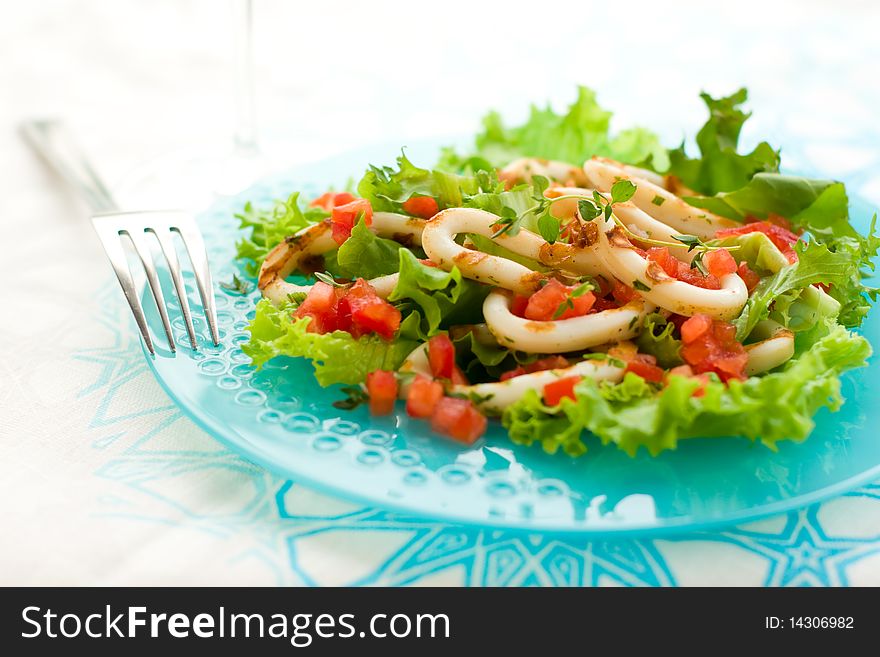 Grilled calamari with tomato and red bell pepper salsa