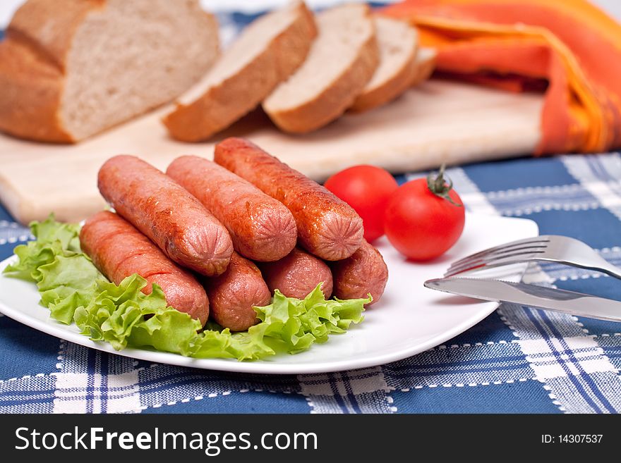 A Plate with hot sausages