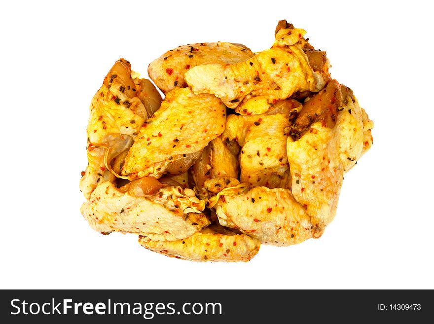 Delicious healthy fresh raw barbecue chicken wings ready to prepare on a plate isolated on white background