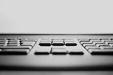 Horizontal Black And White Keyboard Keys Bokeh Background Stock Image